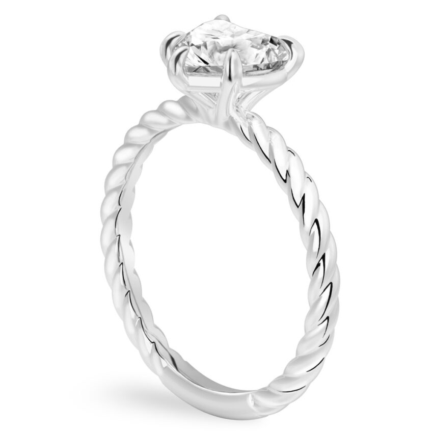 Angle view of heart shape diamond twisted rope engagement ring in palladium