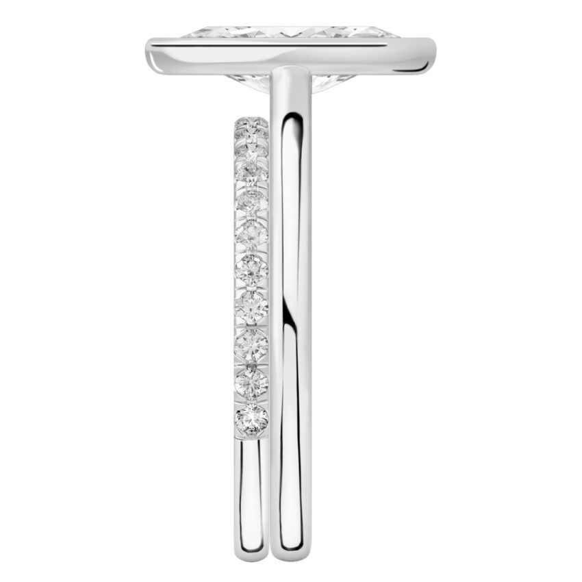 Side view of marquise cut diamond bezel engagement ring set palladium