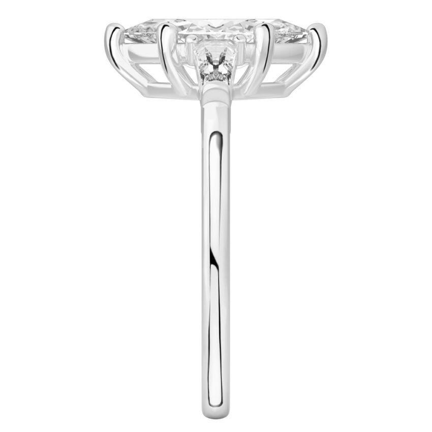 Side view of marquise cut diamond tapered baguette engagement ring in palladium