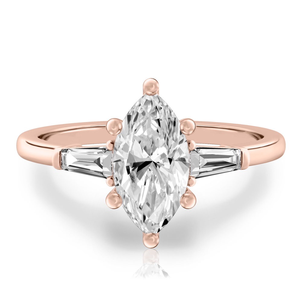 marquise cut diamond tapered baguette engagement ring in rose gold