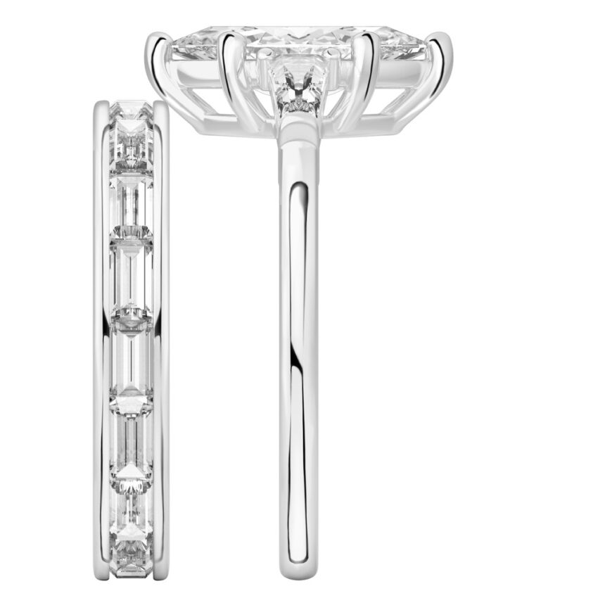 Side view of marquise cut diamond tapered baguette engagement ring set palladium