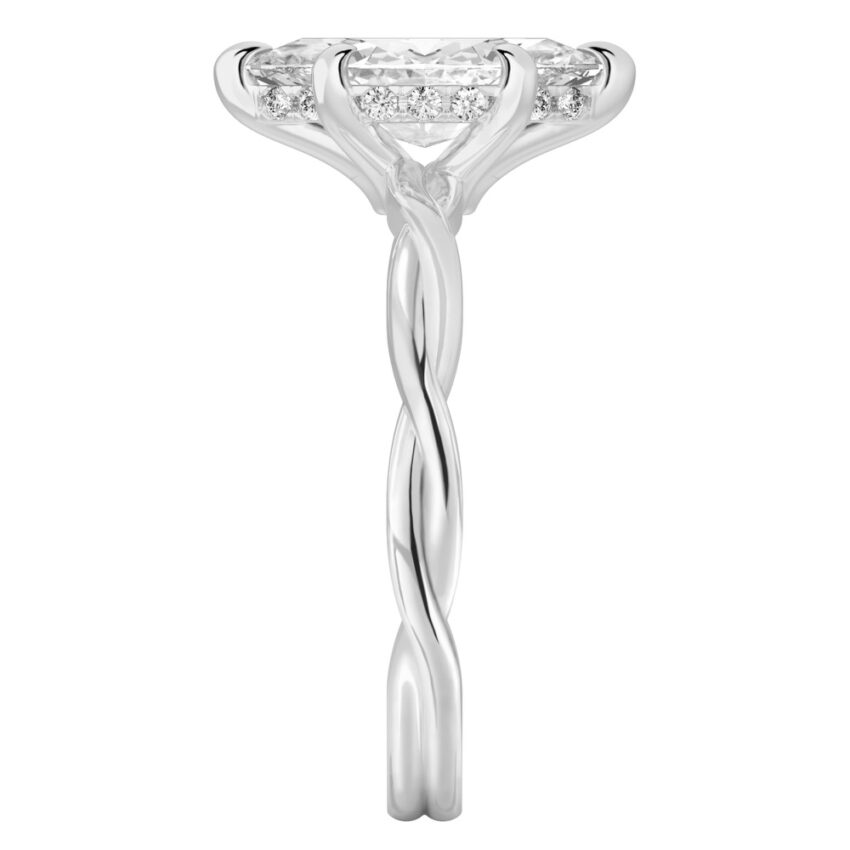 Side view of marquise cut diamond twisted hidden halo engagement ring in platinum