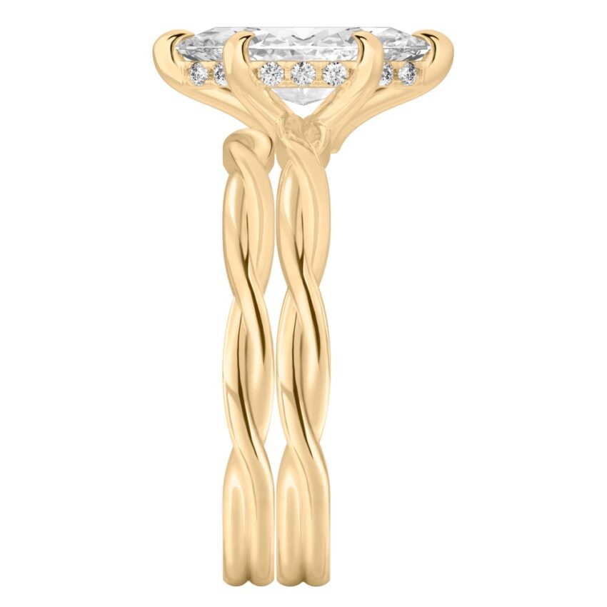 Side view of marquise cut diamond twisted hidden halo engagement ring set yellow gold