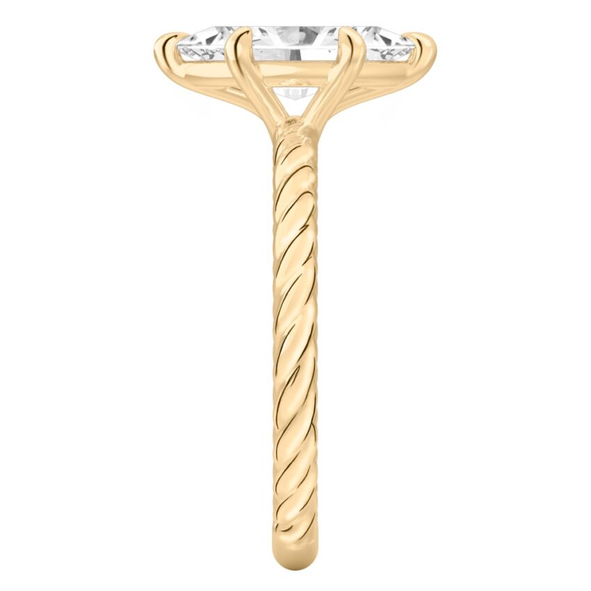 Side view of marquise cut diamond twisted rope engagement ring in yellow gold