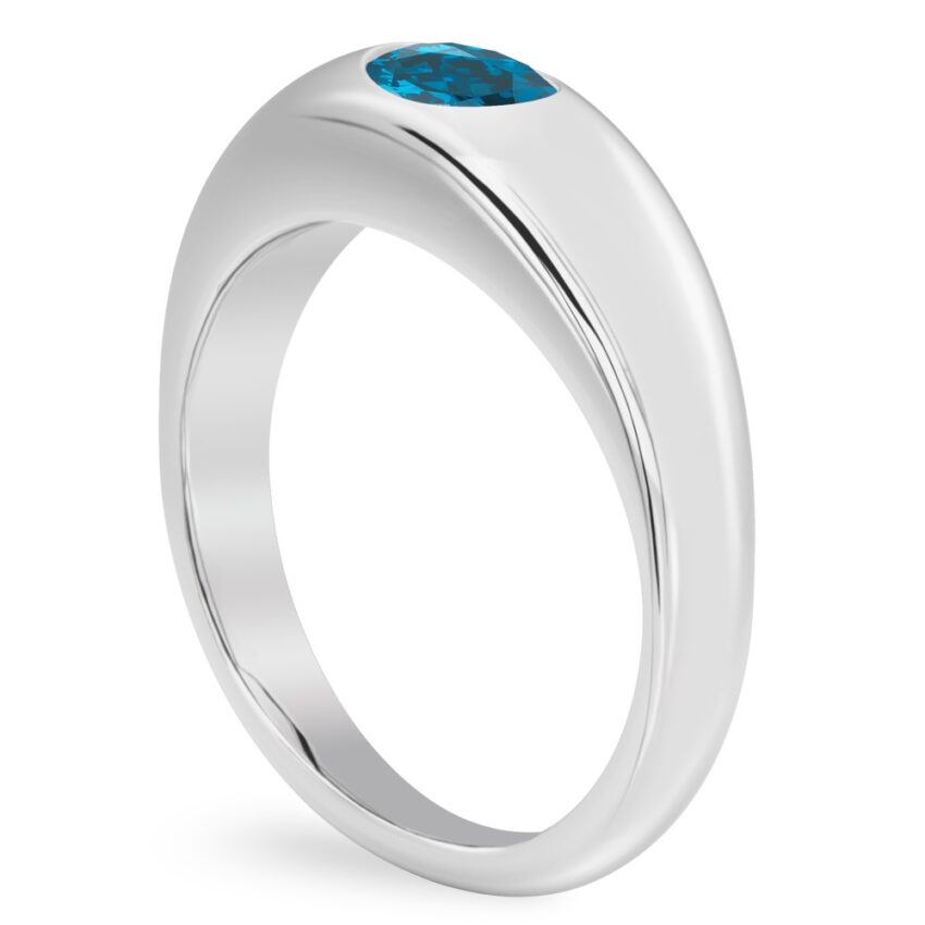 Angle view of oval shape december birthstone dome ring platinum