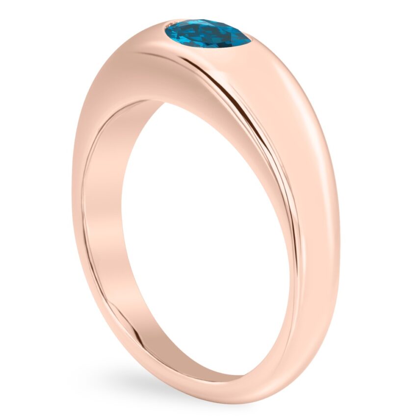 Angle view of oval shape december birthstone dome ring rose gold