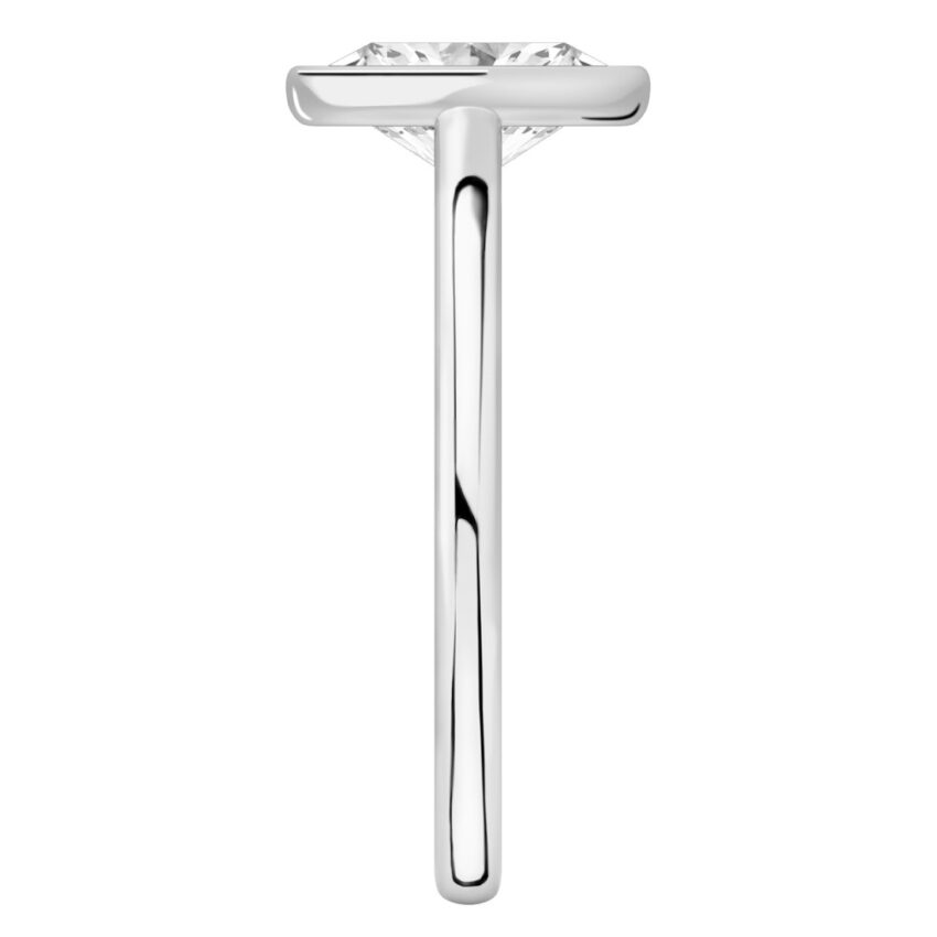 Side view of oval shape diamond bezel engagement ring in platinum