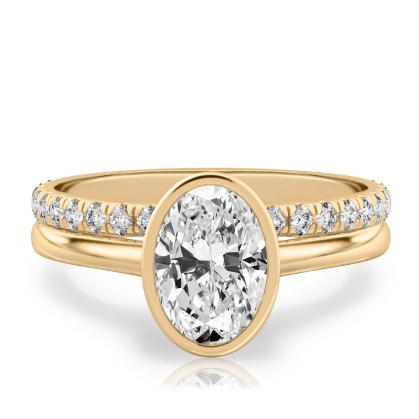 oval shape diamond bezel engagement ring set yellow gold