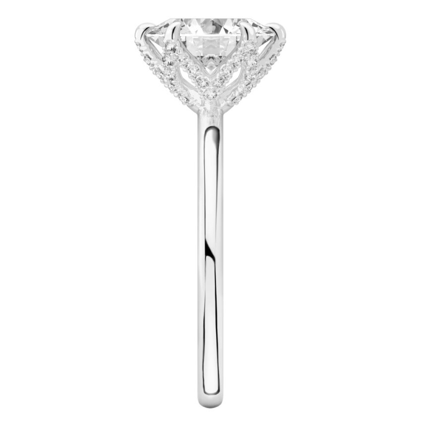Side view of oval shape diamond pave petal prong engagement ring in platinum