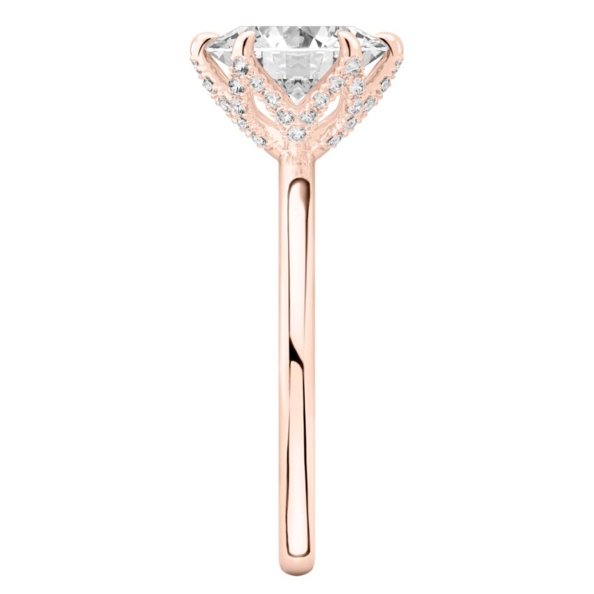 Side view of oval shape diamond pave petal prong engagement ring in rose gold