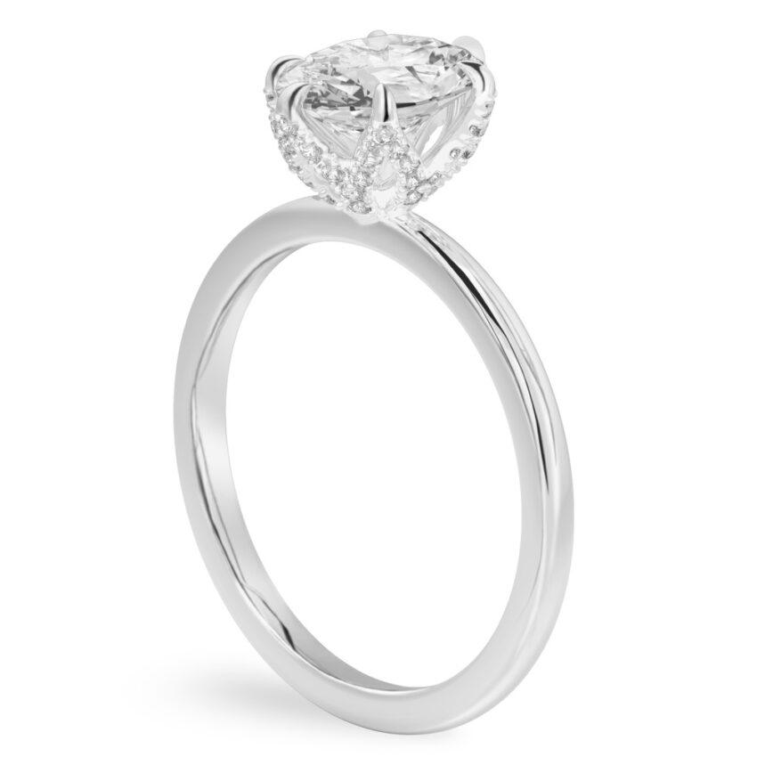 Angle view of oval shape diamond pave petal prong engagement ring in white gold
