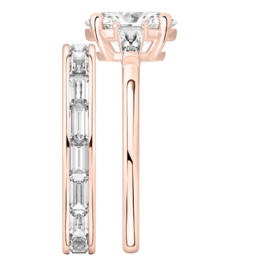 Side view of oval shape diamond tapered baguette engagement ring set rose gold