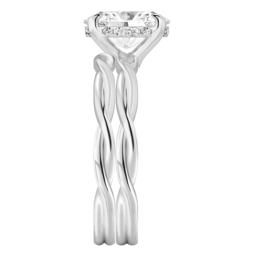Side view of oval shape diamond twisted hidden halo engagement ring set white gold