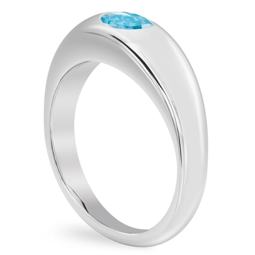 Angle view of oval shape march birthstone dome ring white gold