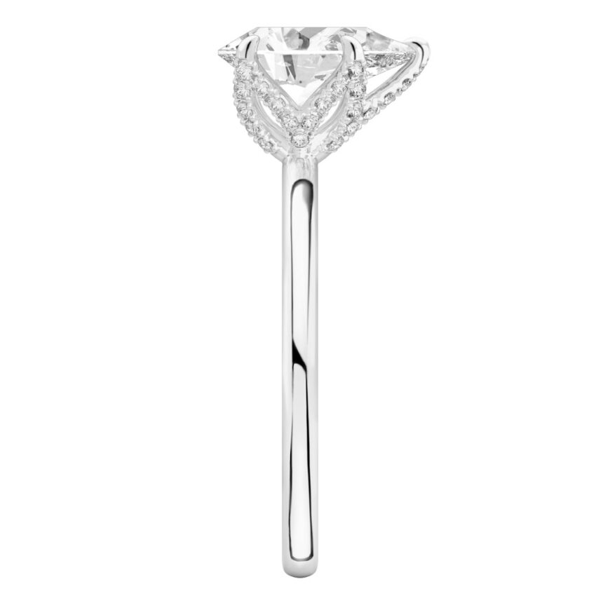 Side view of pear shape diamond pave petal prong engagement ring in white gold