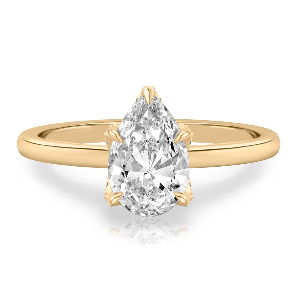 pear shape diamond pave petal prong engagement ring in yellow gold