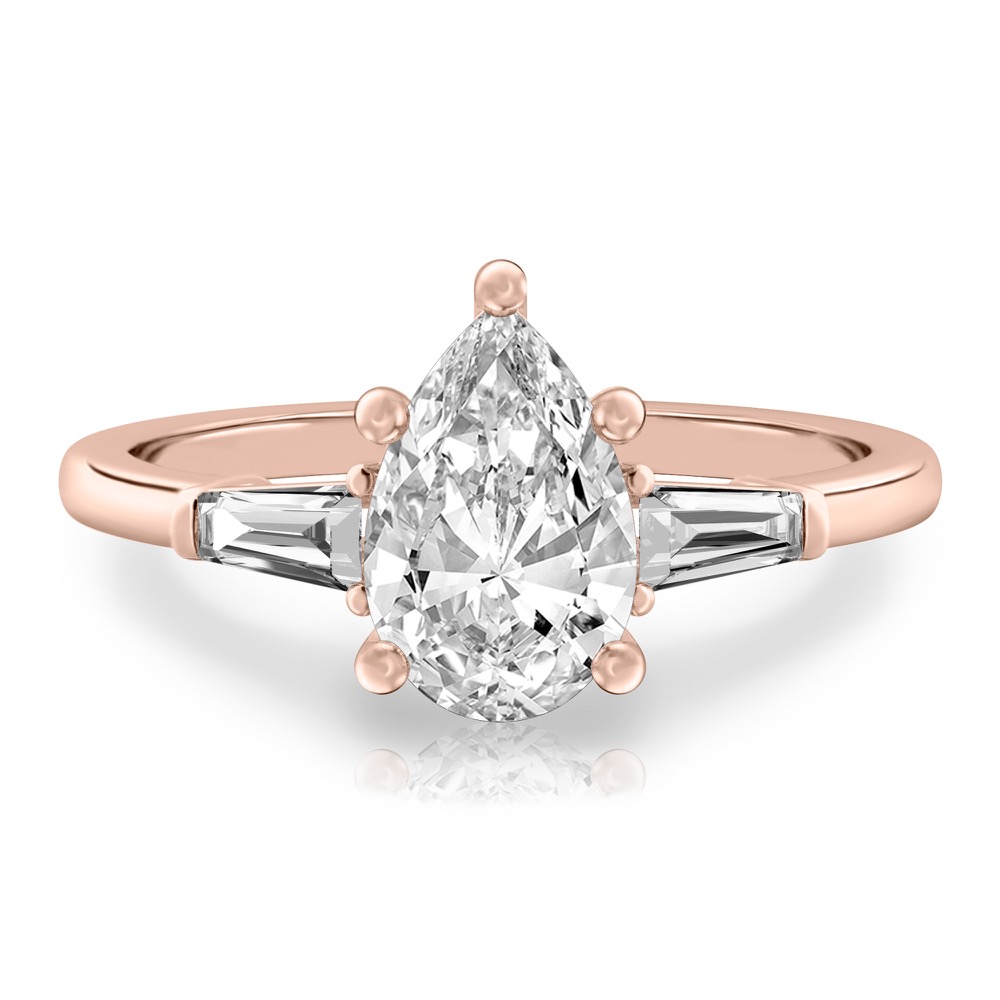 pear shape diamond tapered baguette engagement ring in rose gold
