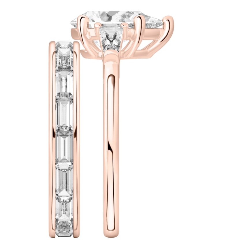 Side view of pear shape diamond tapered baguette engagement ring set rose gold