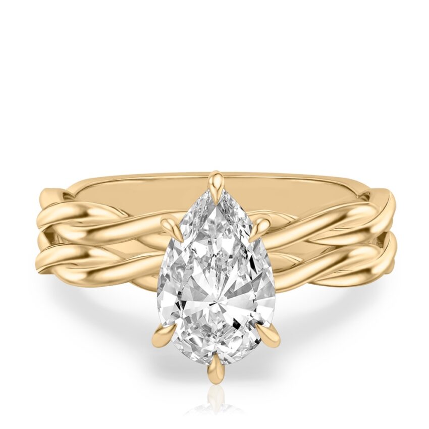 pear shape diamond twisted hidden halo engagement ring set yellow gold