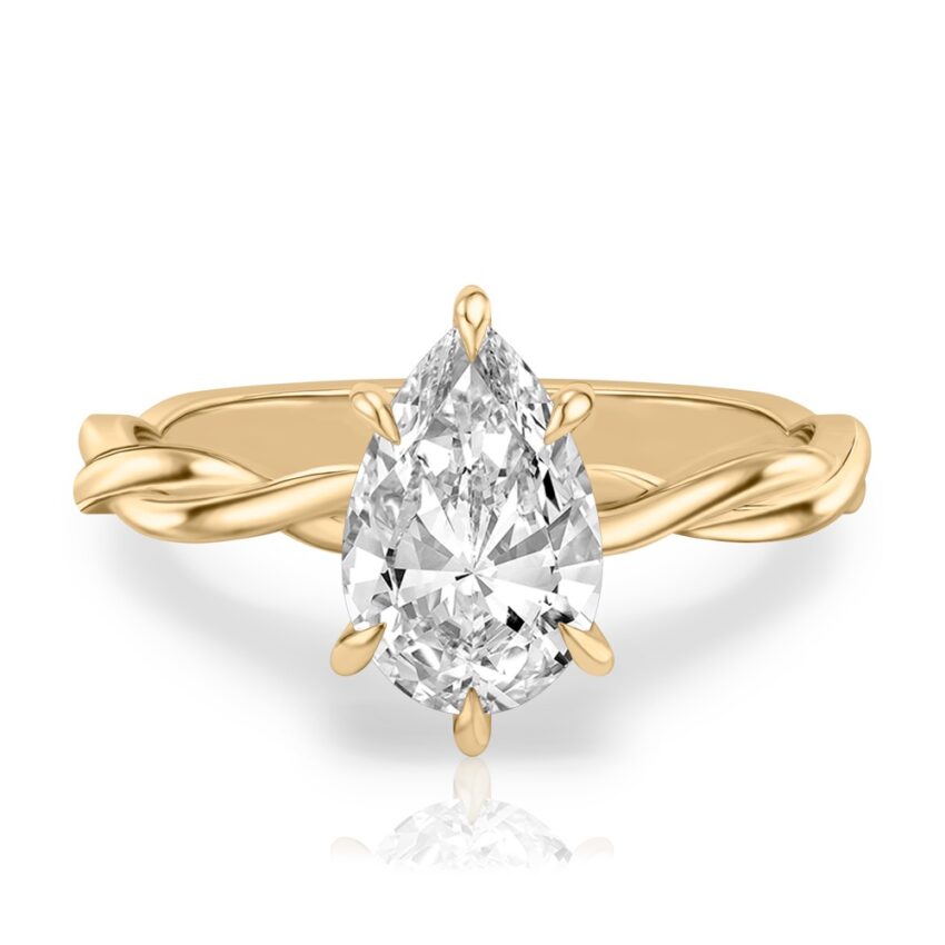 pear shape diamond twisted hidden halo engagement ring in yellow gold