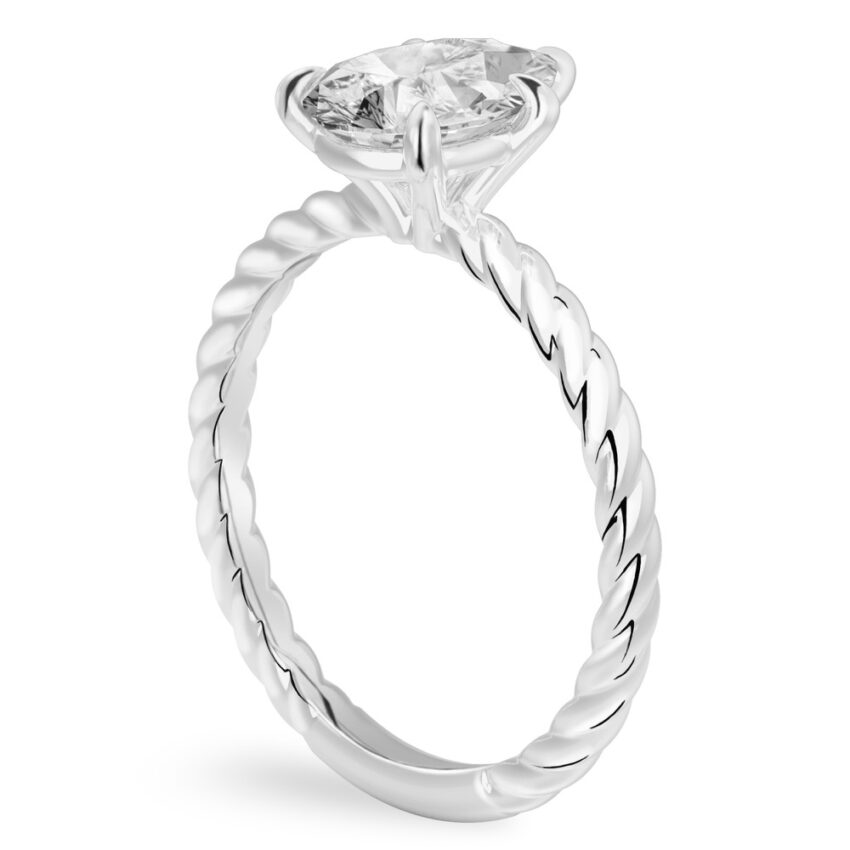 Angle view of pear shape diamond twisted rope engagement ring in palladium