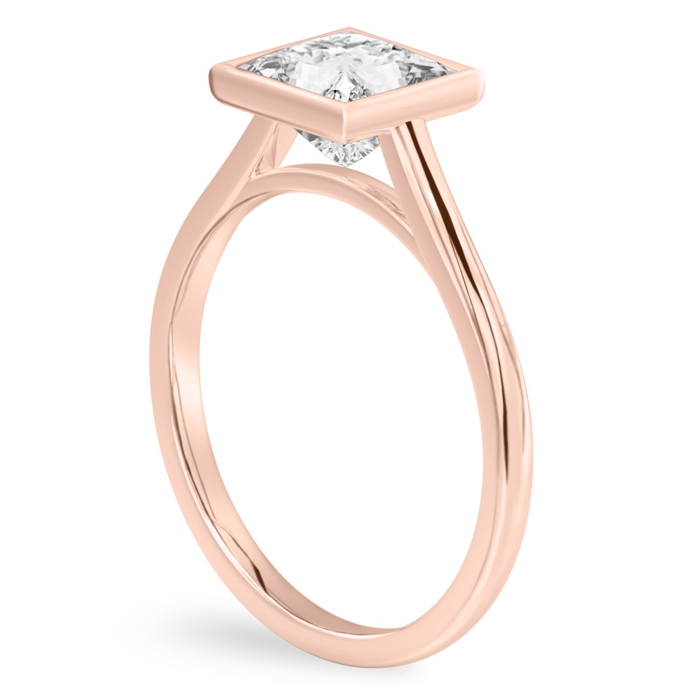 Angle view of princess cut diamond bezel engagement ring in rose gold