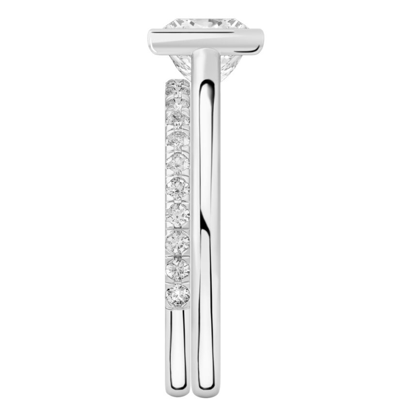 Side view of princess cut diamond bezel engagement ring set white gold