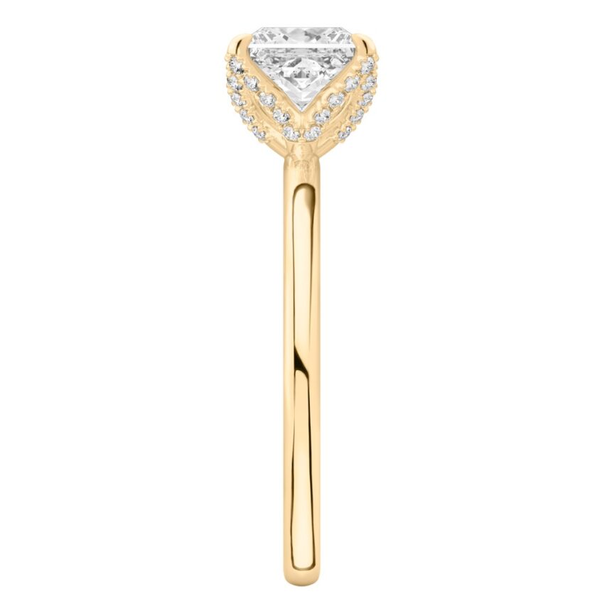Side view of princess cut diamond pave petal prong engagement ring in yellow gold