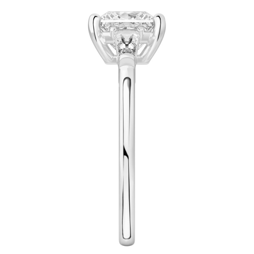 Side view of princess cut diamond tapered baguette engagement ring in palladium