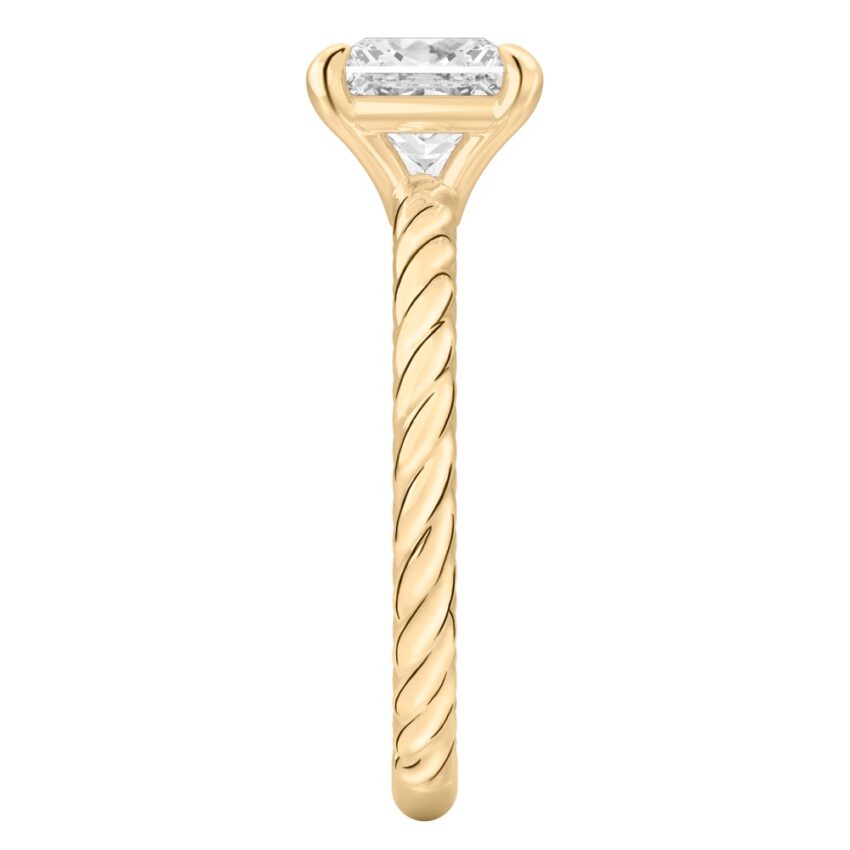 Side view of princess cut diamond twisted rope engagement ring in yellow gold
