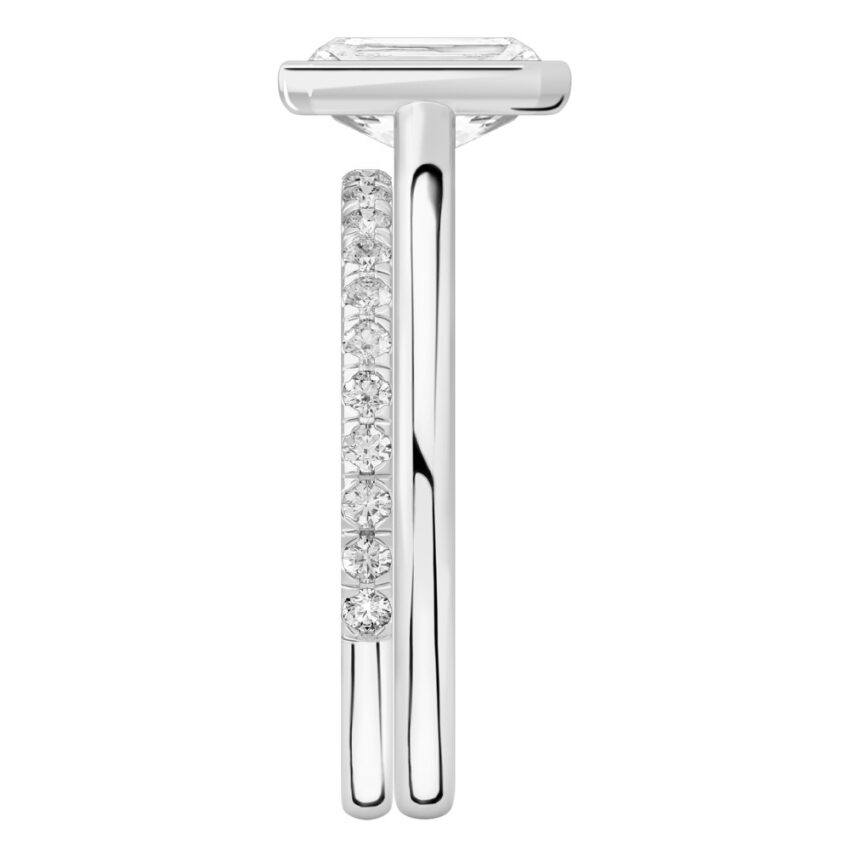 Side view of radiant cut diamond bezel engagement ring set platinum