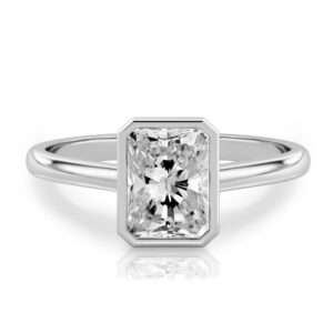 radiant cut diamond bezel engagement ring in white gold