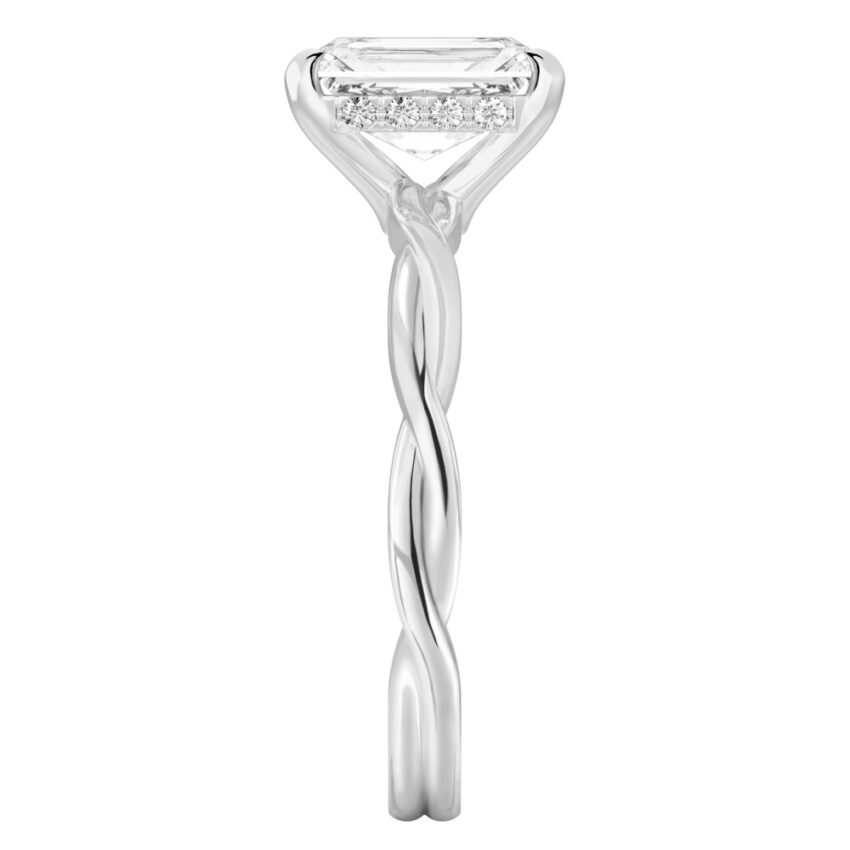 Side view of radiant cut diamond twisted hidden halo engagement ring in white gold