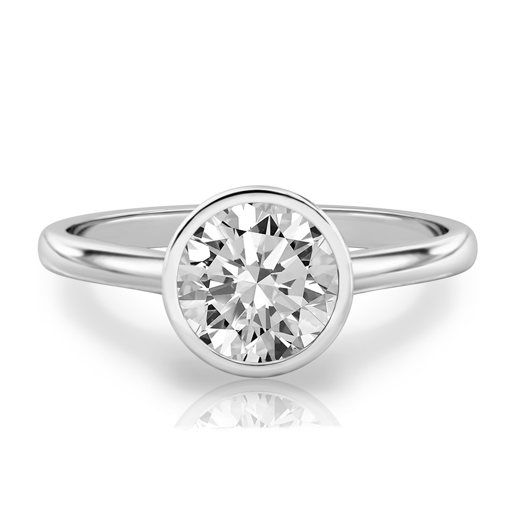 round cut diamond bezel engagement ring in platinum