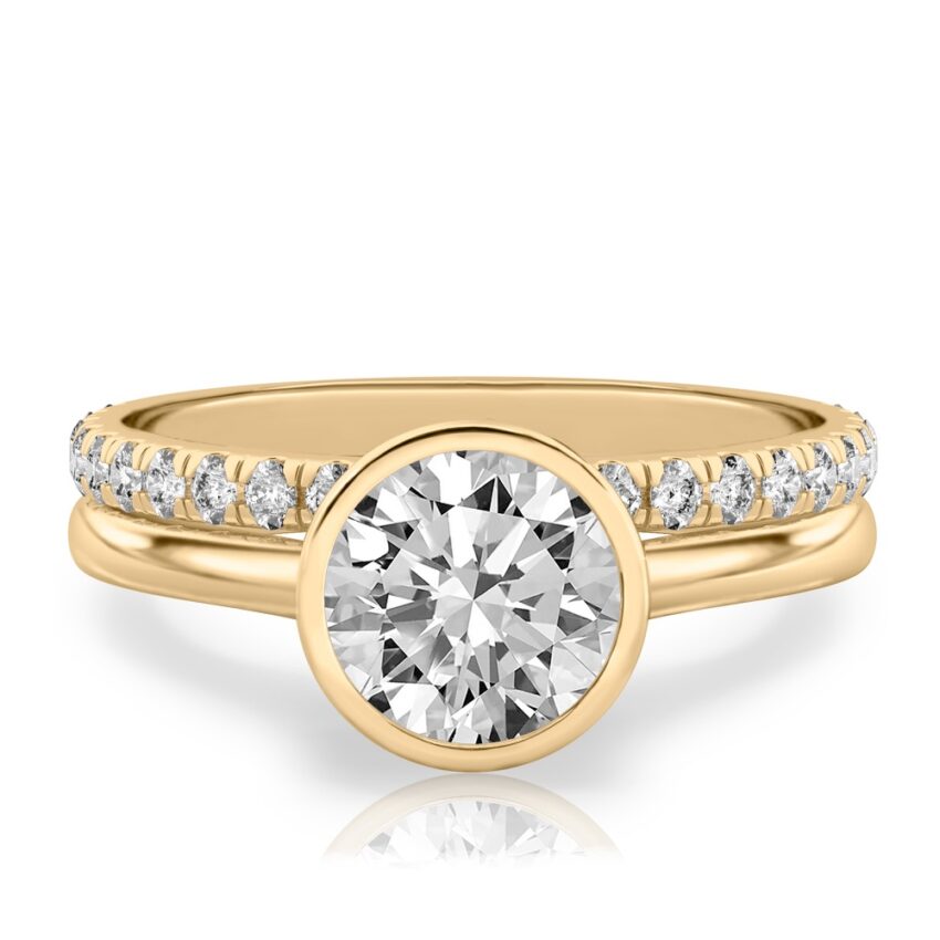 round cut diamond bezel engagement ring set yellow gold