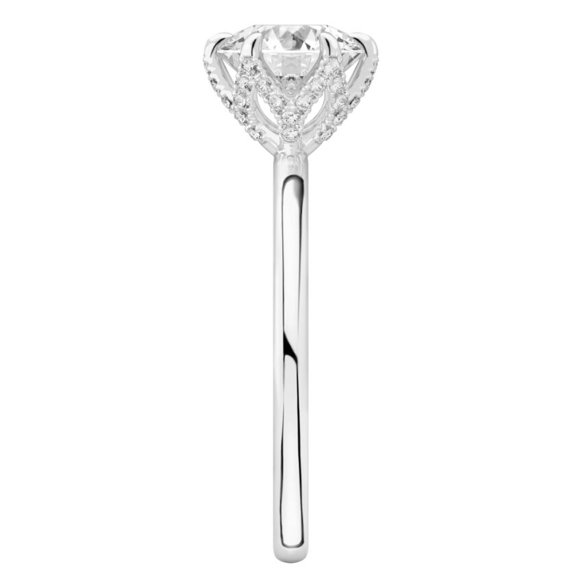 Side view of round cut diamond pave petal prong engagement ring in white gold