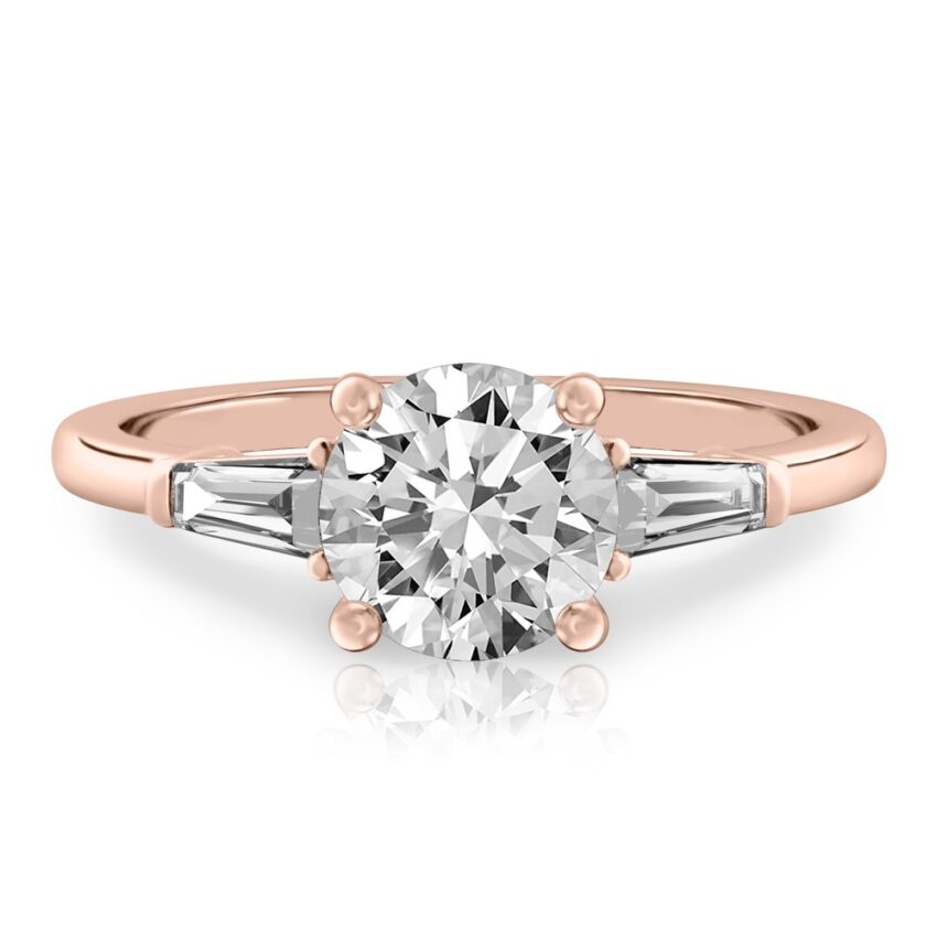 round cut diamond tapered baguette engagement ring in rose gold