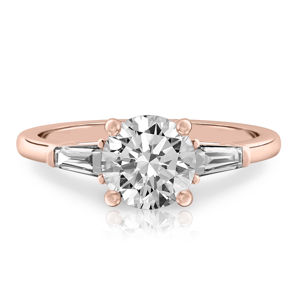round cut diamond tapered baguette engagement ring in rose gold