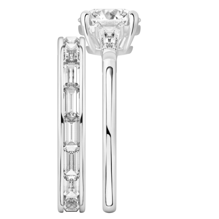Side view of round cut diamond tapered baguette engagement ring set white gold