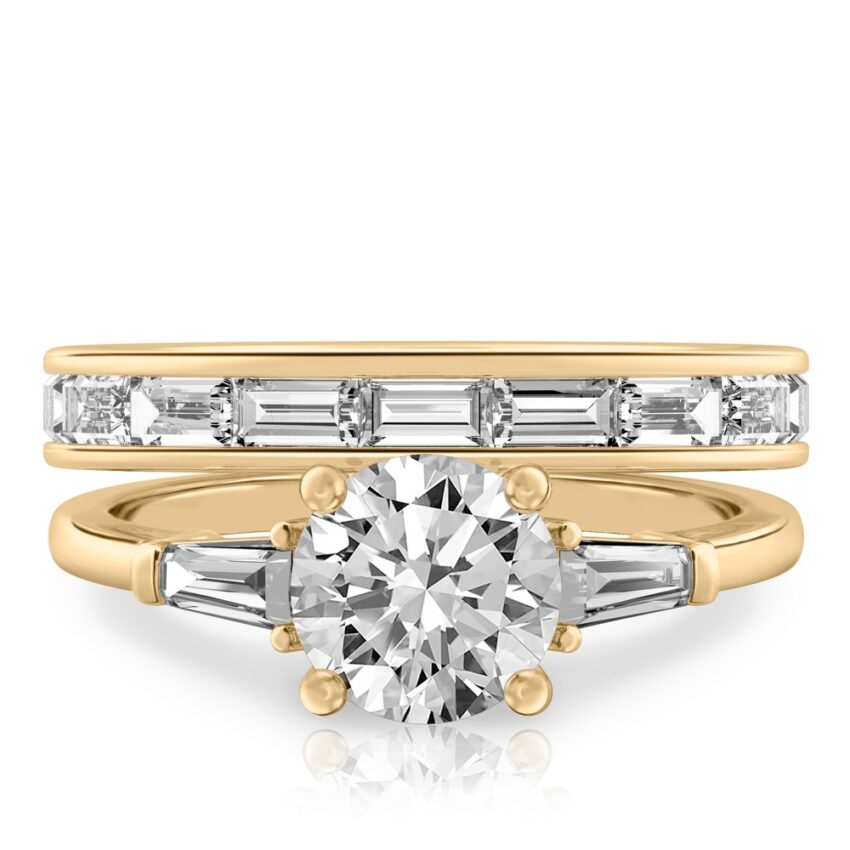 round cut diamond tapered baguette engagement ring set yellow gold