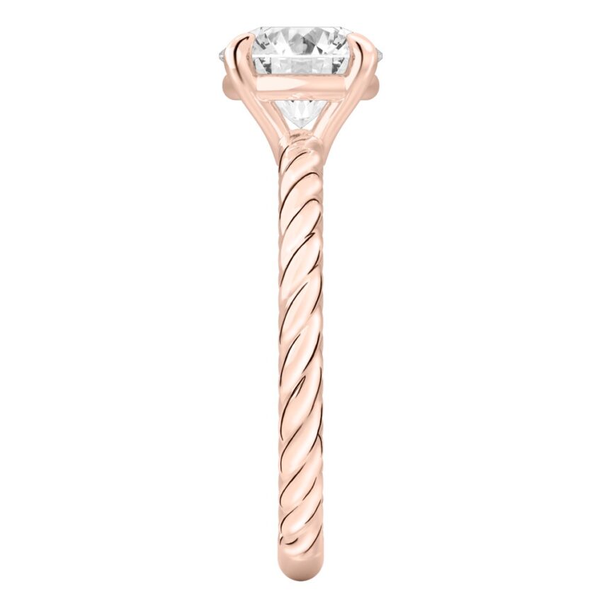 Side view of round cut diamond twisted rope engagement ring in rose gold