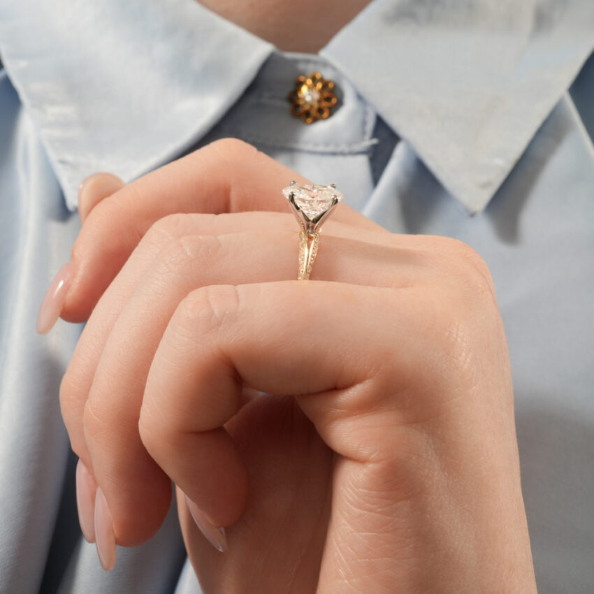 Angle view of split shank knife edge ring lifestyle