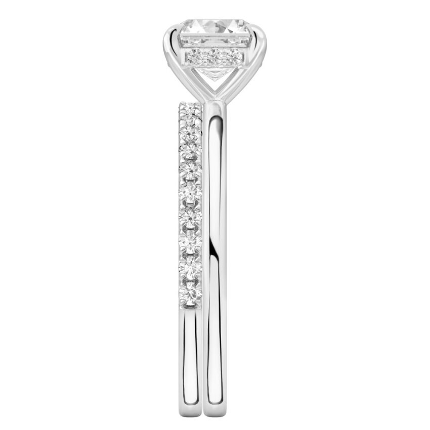 Side view of asscher cut diamond hidden halo engagement ring set platinum