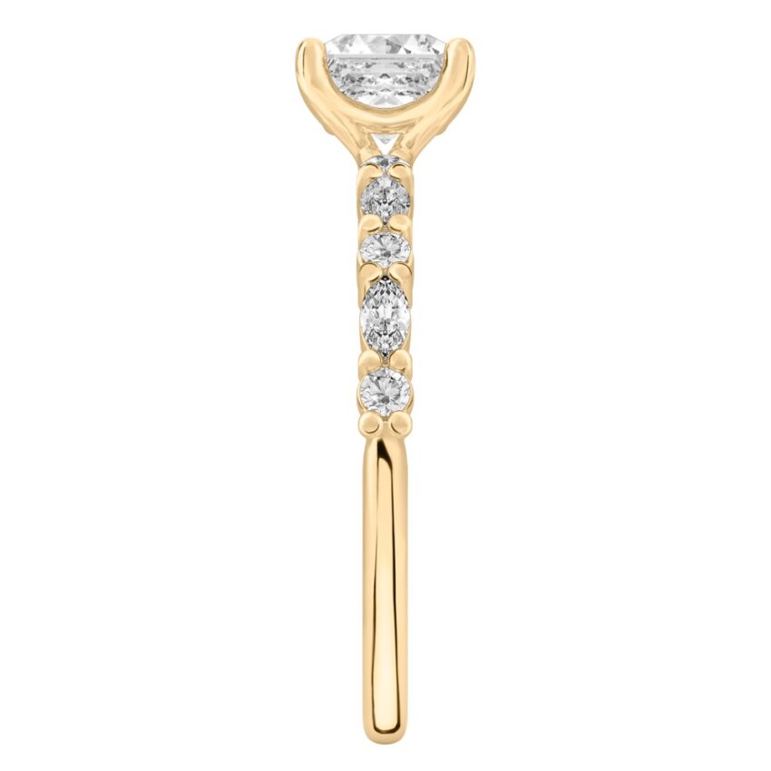 Side view of asscher cut diamond marquise and round diamond ring yellow gold