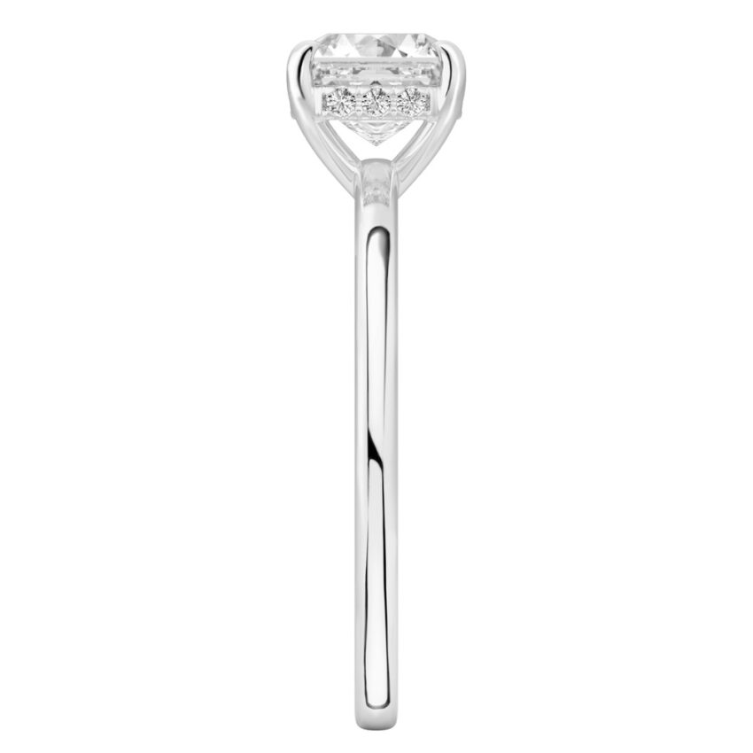 Side view of asscher cut diamond ultra low hidden halo engagement ring in white gold