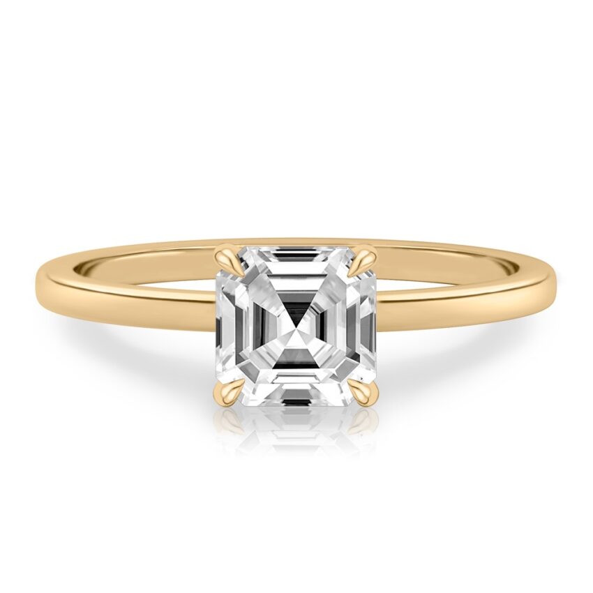 asscher cut diamond ultra low hidden halo engagement ring in yellow gold