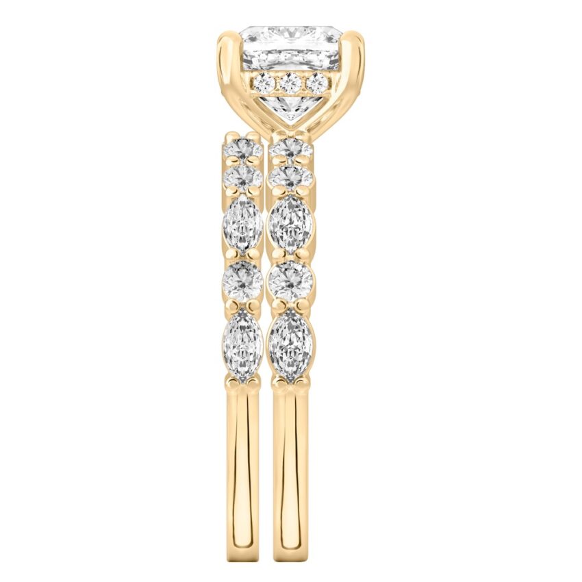 Side view of cushion cut diamond hidden halo marquise and round diamond ring set yellow gold
