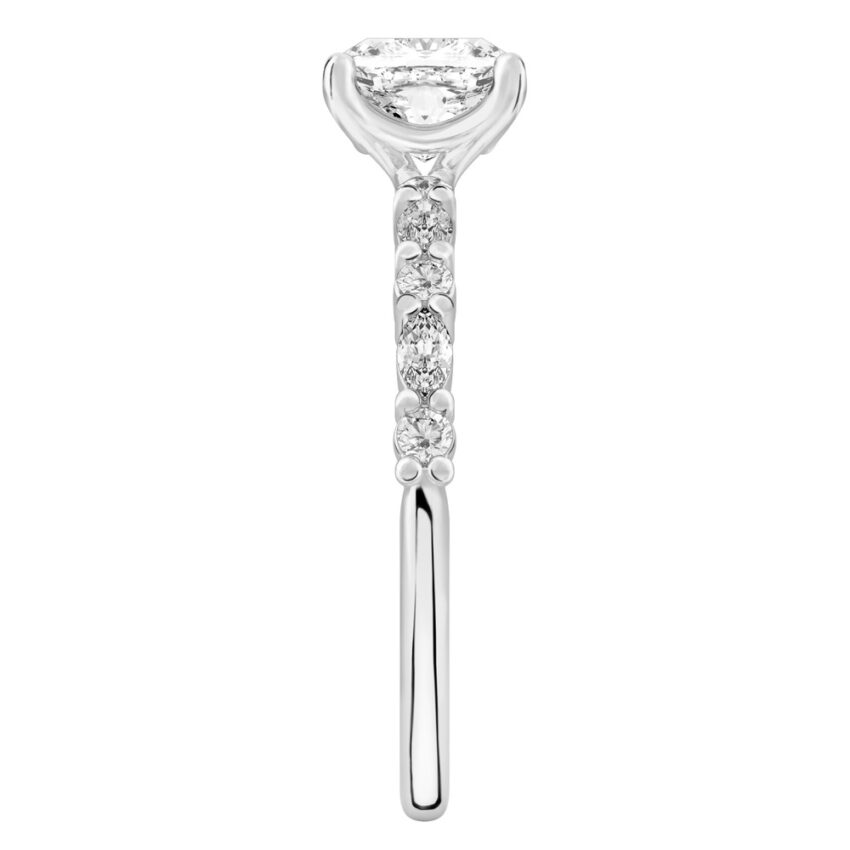 Side view of cushion cut diamond marquise and round diamond ring platinum