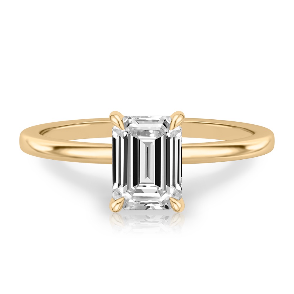 emerald cut diamond flush hidden halo engagement ring in yellow gold