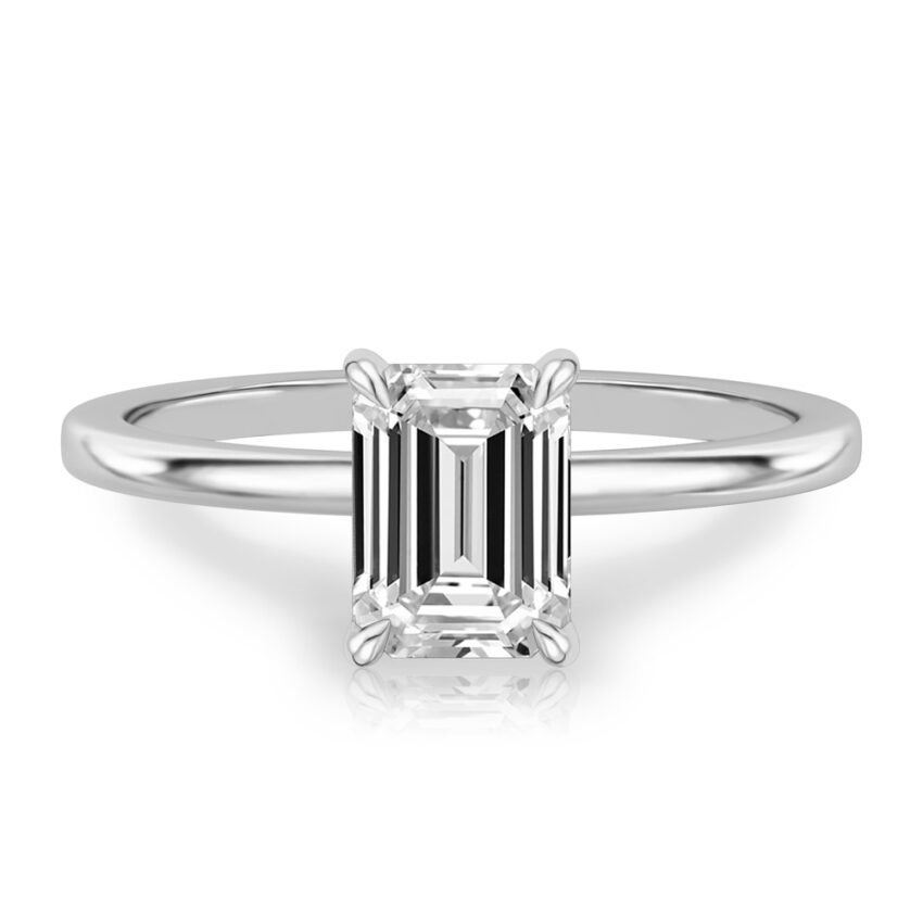 emerald cut diamond hidden halo engagement ring in platinum
